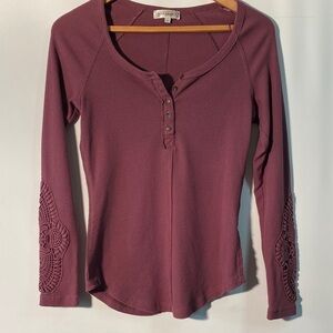 Women's Long Sleeve Top with Crochet Detail on the Sleeves.